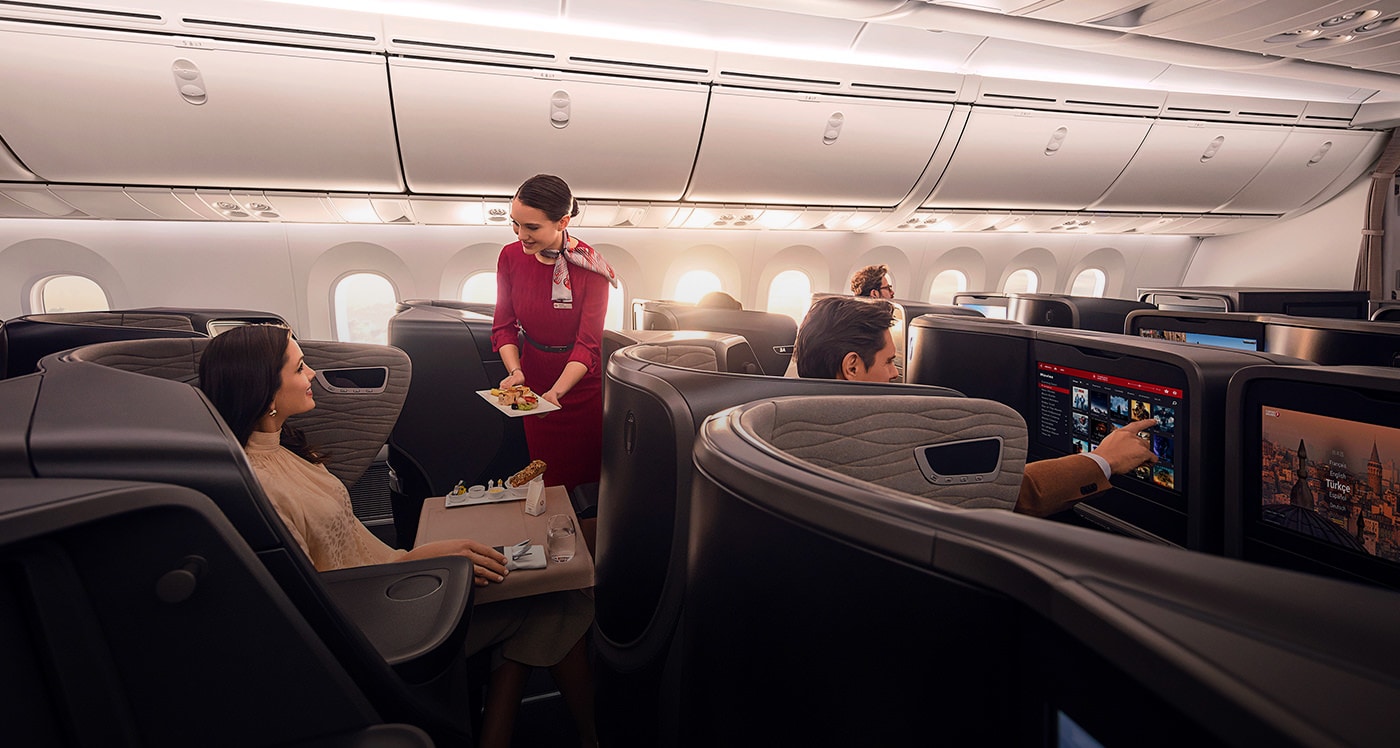 hostess-who-started-the-dining-on-board-service-in-thy-business-class-cabin.jpg